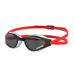 A pair of Ascender open water goggles with polarized/smoke lenses, featuring a red and black silicone strap.
